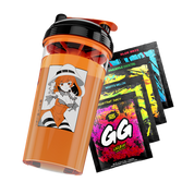 Orange and black shaker cup with anime witch girl design next to colorful energy drink powder packets in various flavors.