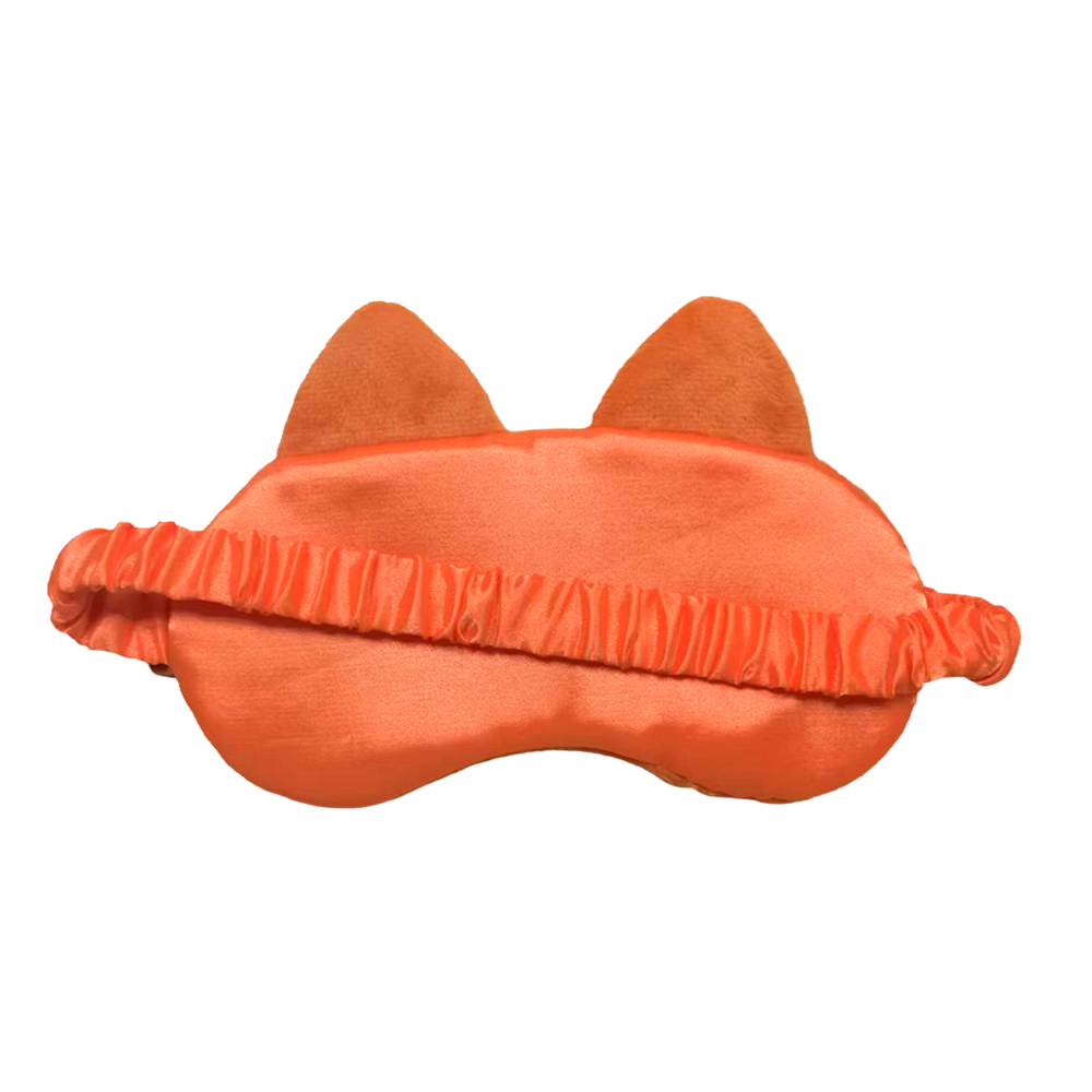 An orange cat-themed sleep mask with plush ears and a ruffled elastic band, shown against a plain white background.